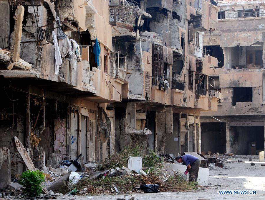 SYRIA-DAMASCUS-DARAYA-PEOPLE-RETURN-HOME