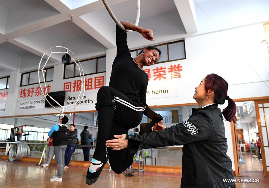 Foreign students from Ethiopia, Laos and other nations came to receive one-year training of acrobatics in Wuqiao in this July Foreign students from Ethiopia, Laos and other nations came to receive one-year training of acrobatics in Wuqiao in this July