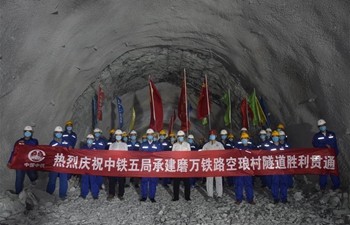 Key tunnel of China-Laos railway drilled through: constructor