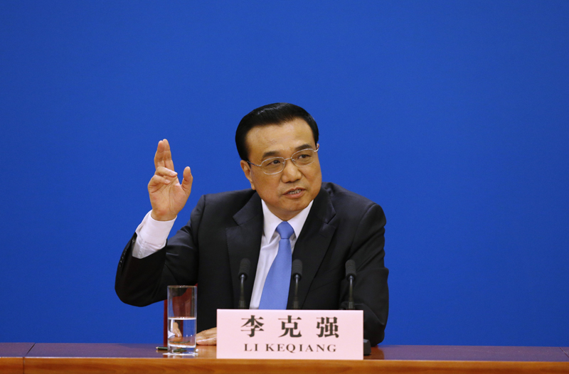 3月15日，國務(wù)院總理李克強在北京人民大會堂與中外記者見面，并回答記者提問。 新華社記者 沈伯韓 攝