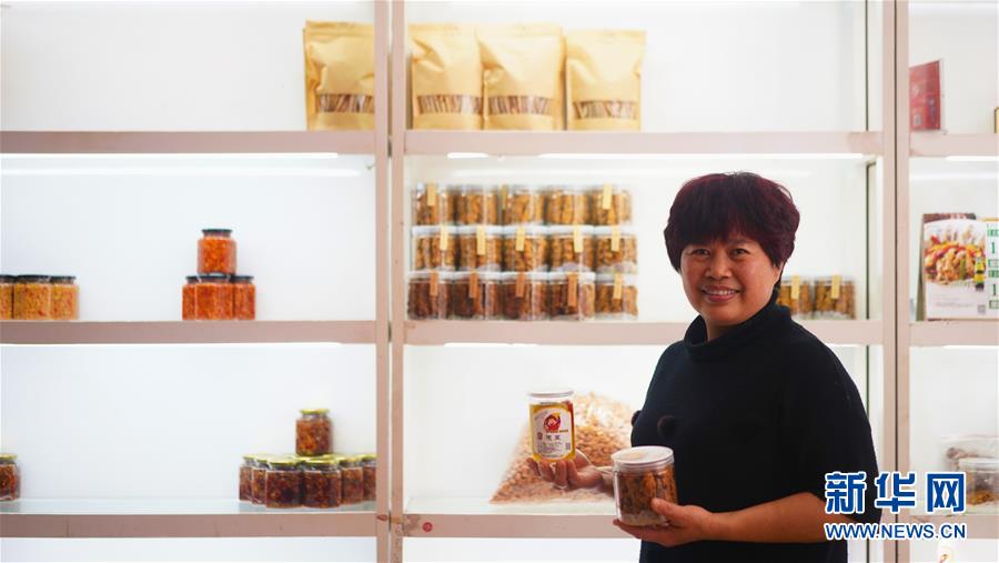 (鄉(xiāng)村振興·圖文互動(dòng))(3)“生活的滋味都在泡菜里”——江西瑞金“華嬤嬤”奮斗記