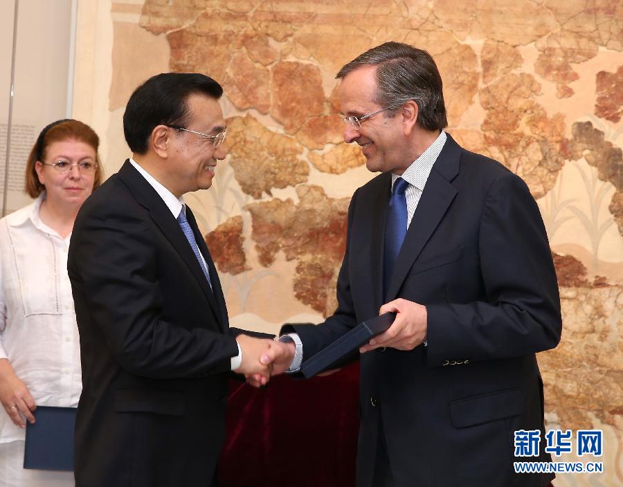 6月21日，國務(wù)院總理李克強與希臘總理薩馬拉斯共同出席希臘伊拉克利翁博物館新館開館儀式并發(fā)表講話。 新華社記者 龐興雷 攝