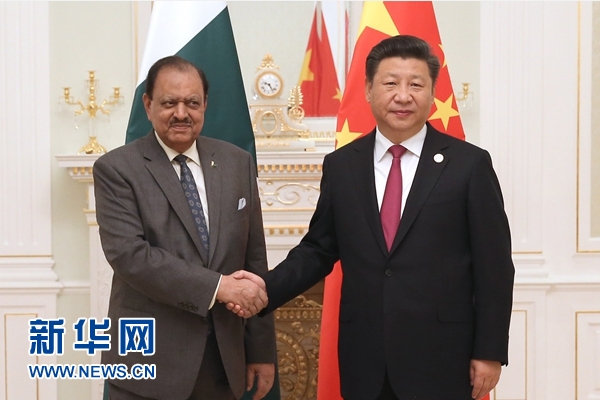 6月23日，國家主席習近平在塔什干會見巴基斯坦總統(tǒng)侯賽因。新華社記者馬占成攝