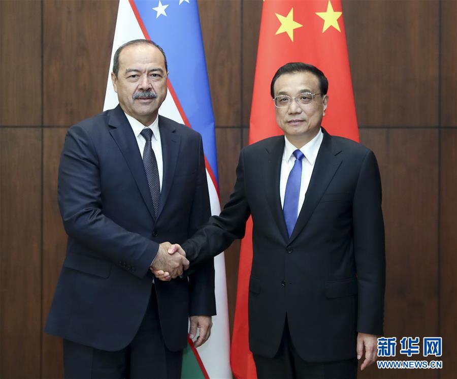 (時(shí)政)李克強(qiáng)會(huì)見(jiàn)烏茲別克斯坦總理阿里波夫