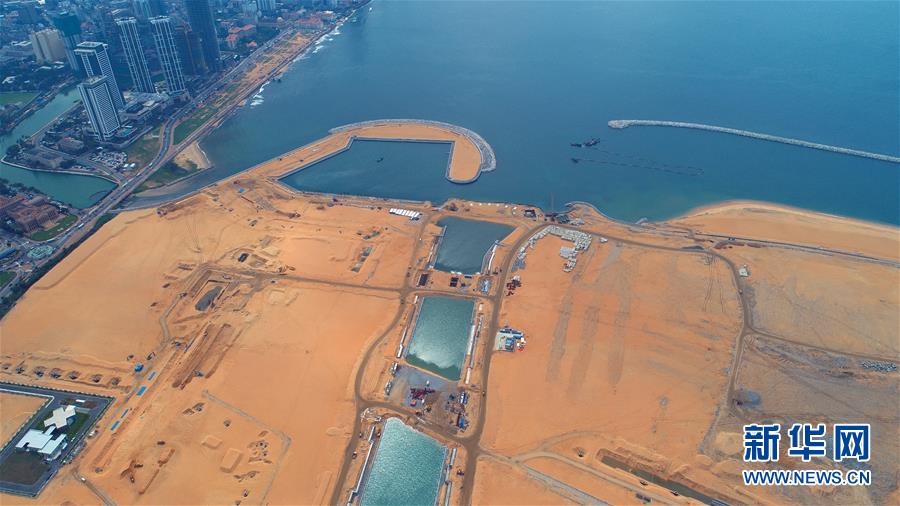 (國(guó)際·圖文互動(dòng))(2)通訊:“五年我們?yōu)樗估锾m卡造出一片新土地”——科倫坡港口城人的自豪與希冀