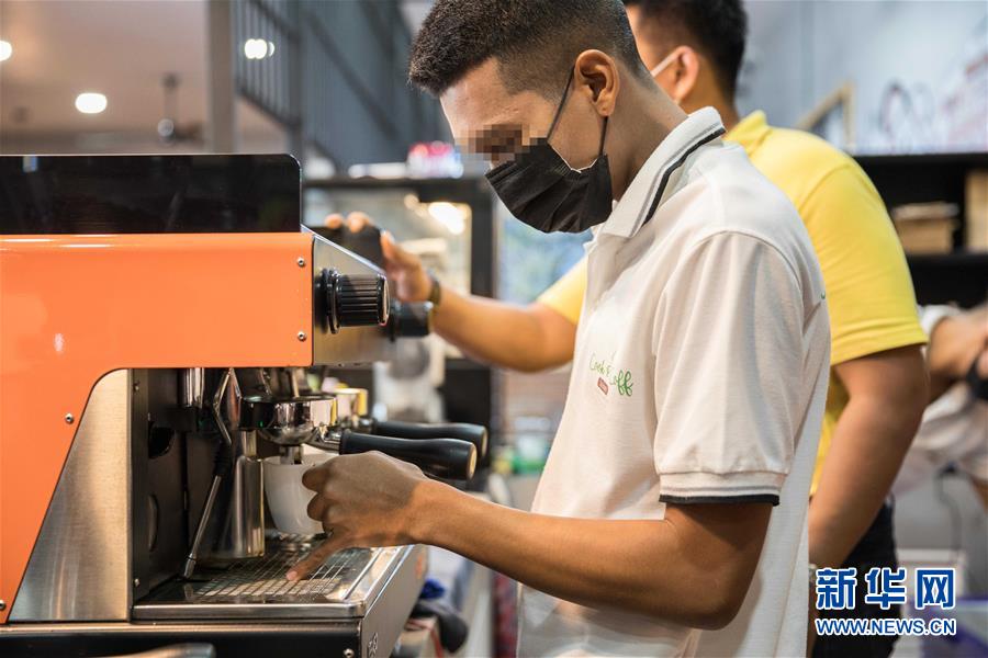 (國際·圖文互動)(5)走進(jìn)泰國社區(qū)的“監(jiān)獄咖啡館”