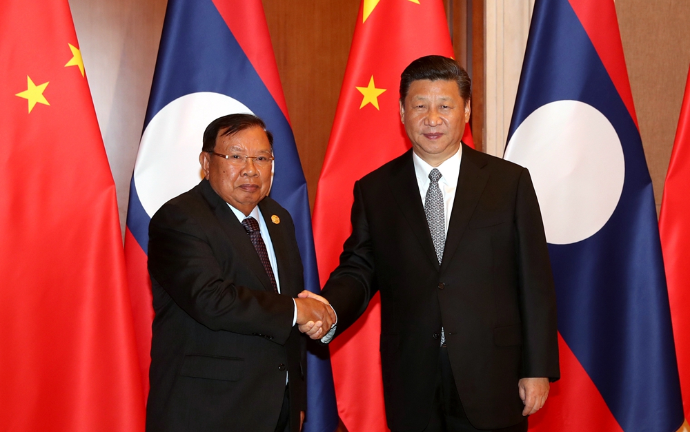 習(xí)近平同老撾人民革命黨中央總書記、國家主席本揚舉行會談